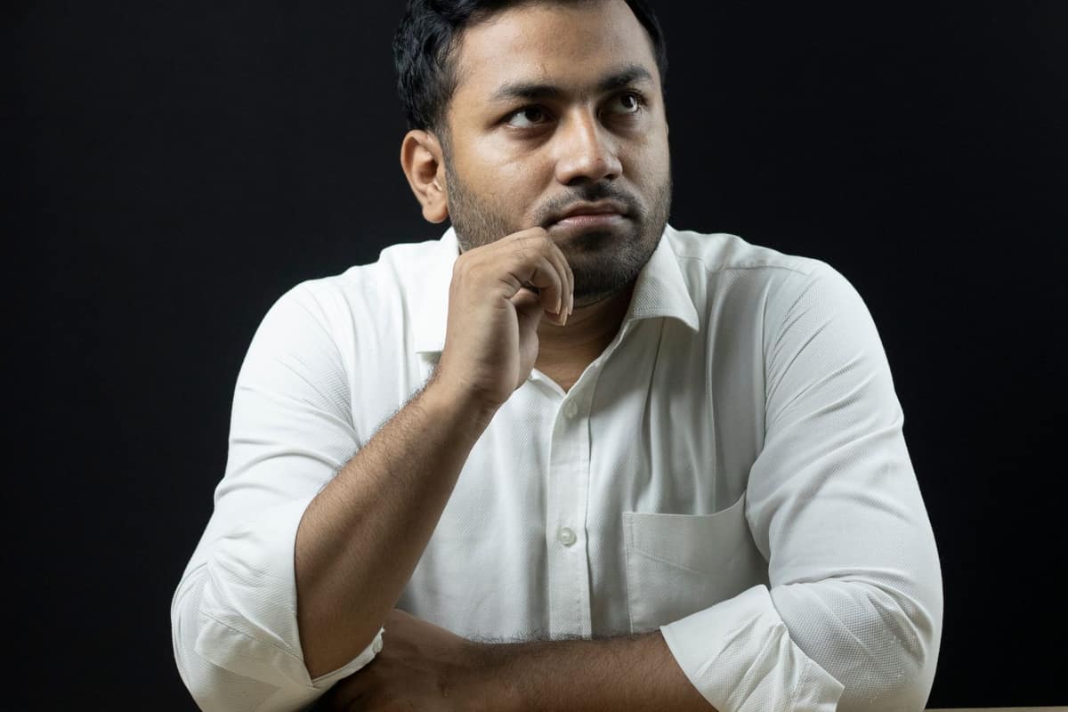 Indian business owner thinking through the year’s numbers