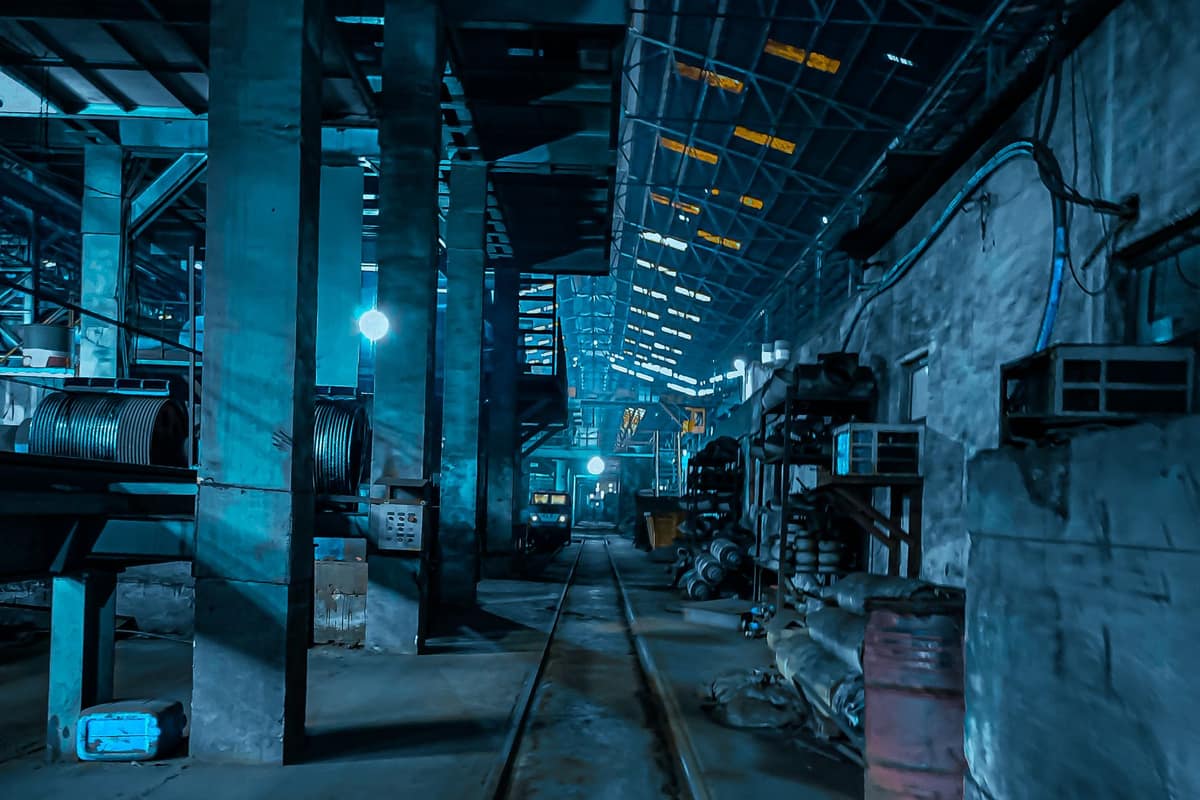 Inside an Indian factory with machinery at night