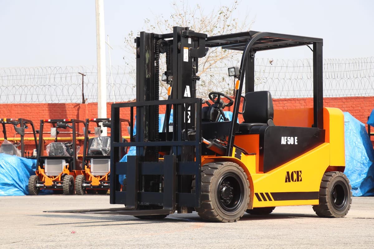 Forklift at an Indian industrial yard ready to load goods for dispatch