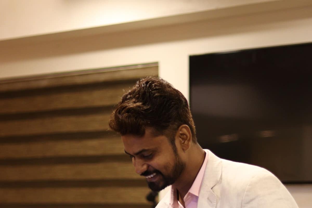 Smiling young professional at work in an Ahmedabad office