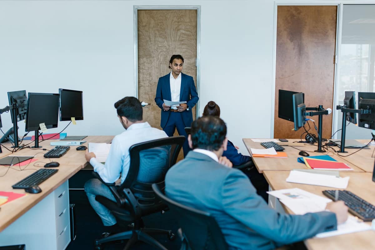 Staff working at desks in an Indian head office